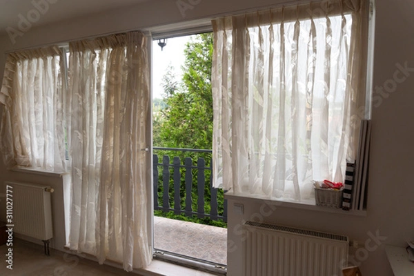 Fototapeta window with closed shutters