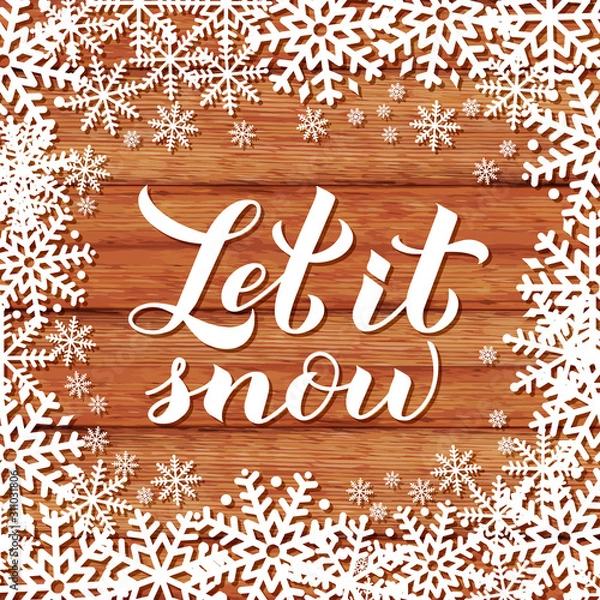Fototapeta Let is snow calligraphy hand lettering on wood background with snowflakes. Christmas, New Year and winter holidays typography poster. Vector template for greeting card, banner, flyer, postcard.