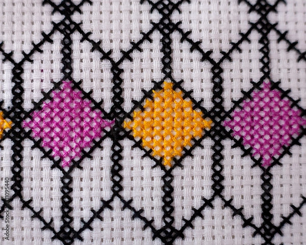 Fototapeta Pattern embroidered with a cross