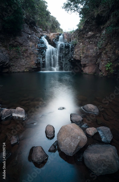 Fototapeta Nature around Lagoa do Vento and Risco waterfalls in Rabacal valley, Paul da Serra plateau, Madeira, Portugal. Smooth water around rocks in the stream, long shutter speed photo.