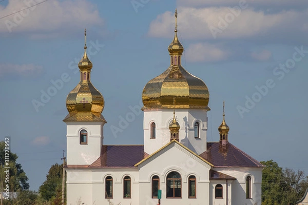 Obraz God's new brick temple with a bell tower