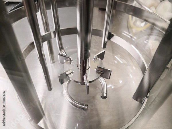 Fototapeta Metal stirring part inside a small laboratory scale reactor for scientific, industrial and biotechnological research