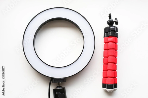 Obraz Ring lamp and tripod for make up on white background.