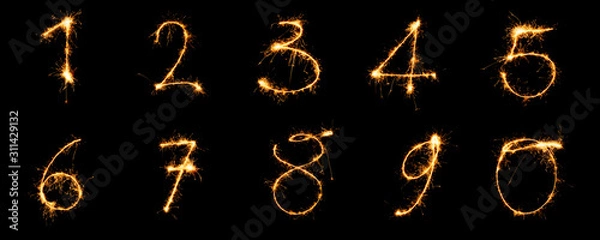 Fototapeta Numbers from 1 to 9 written with sparklers