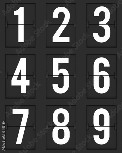 Obraz Set of  numbers from mechanical timetable board