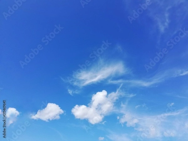 Obraz blue sky with white clouds