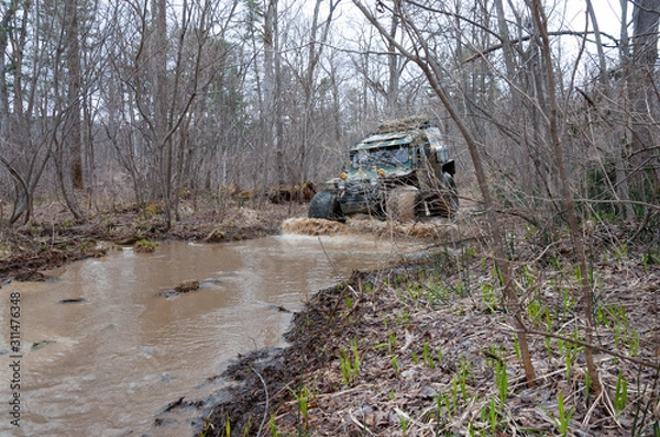 Fototapeta ATV travel in spring in Khabarovsk Territory