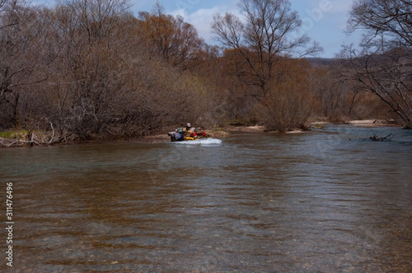 Fototapeta ATV travel in spring in Khabarovsk Territory