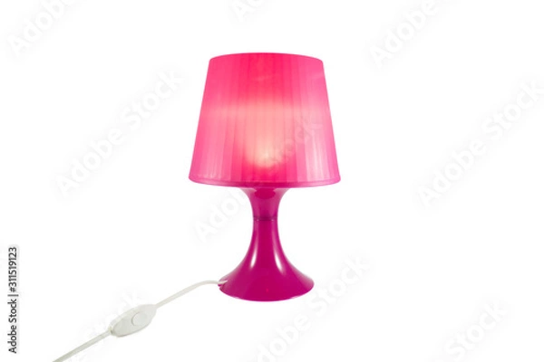 Fototapeta Isolated pink plastic lamp on white background for home decoration.