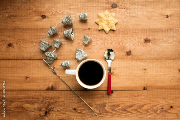 Fototapeta cup of coffee on wooden background with copy space for text