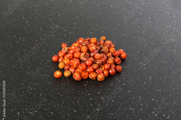 Fototapeta Handful of red spicy tiny round chile tepin peppers