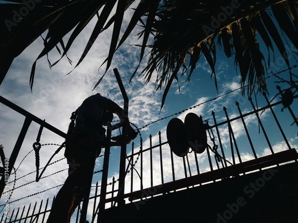 Obraz Working man in shadow