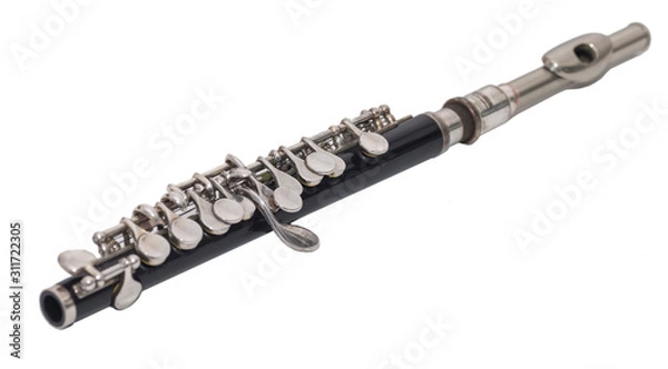 Obraz Piccolo flute on white background, selective focus.