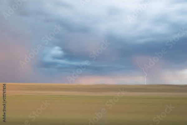 Obraz Lightning from moving train