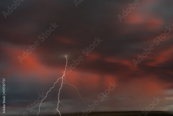 Obraz Lightning from moving train