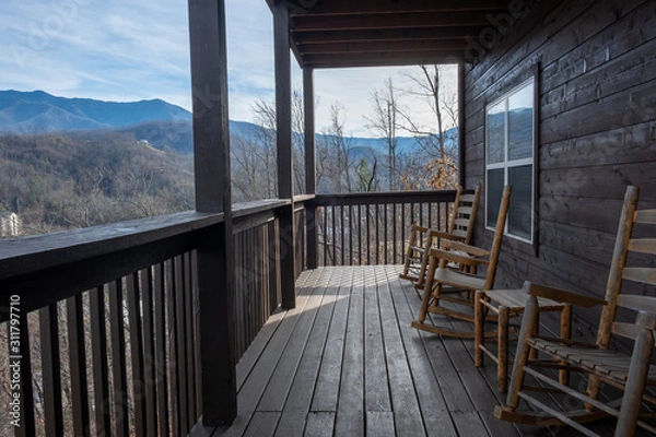 Obraz rocking chairs on porch looking over mountains