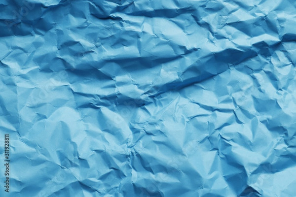 Obraz Crumpled blue paper as background