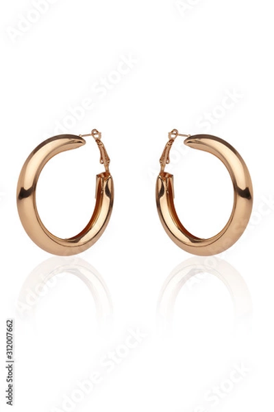 Fototapeta Subject shot of a pair of golden earrings isolated on the white background with reflexion. Each earring is made as a glossy puffed hoop.