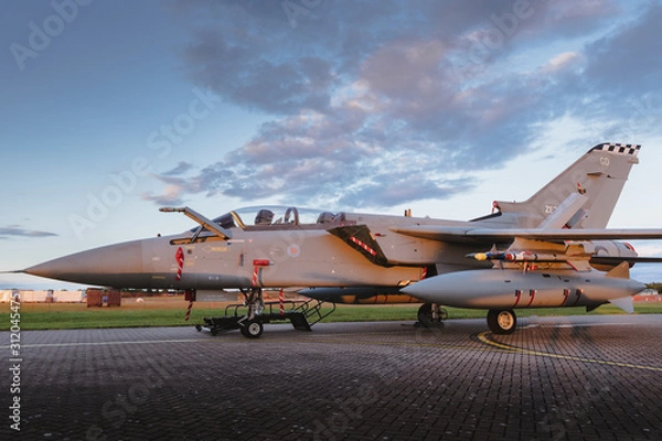 Obraz Military jet at dusk