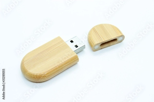 Obraz Wooden flash drive located on a white background