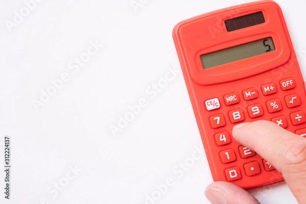 Fototapeta electronic digital calculator for calculate number on white background