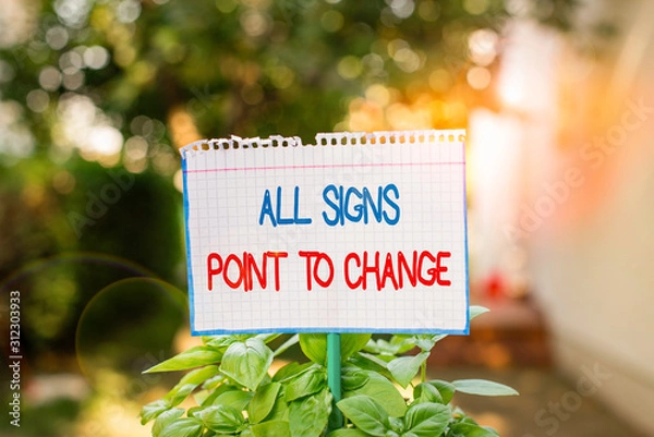 Obraz Word writing text All Signs Point To Change. Business photo showcasing Necessity of doing things differently new vision Plain empty paper attached to a stick and placed in the green leafy plants