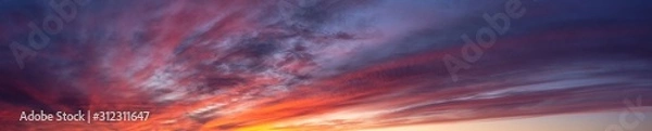 Fototapeta Dramatic Panoramic View of a cloudscape during a dark and colorful sunset. Taken in British Columbia, Canada.