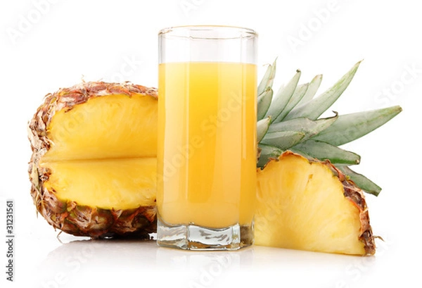 Obraz Glass of pineapple juice with fruit and slices isolated