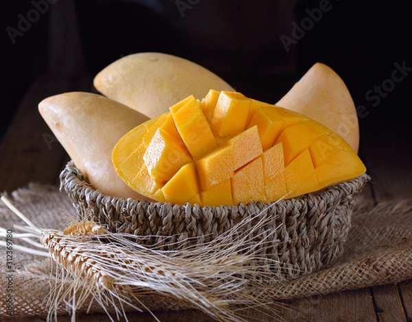 Obraz yellow mango in basket