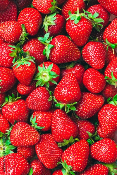 Obraz a lot of ripe juicy shiny red strawberries - food background