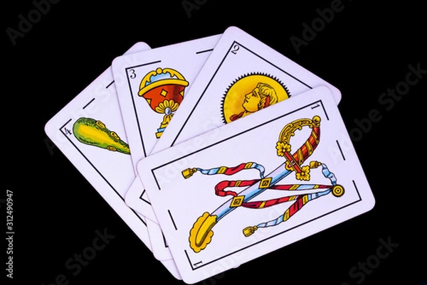 Fototapeta some cards from the spanish deck for playing cards games and gambling on a black background
