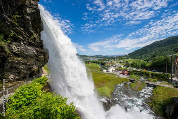 Fototapeta Norheimsund-Bergen / Norway 07.01.2015.Steinsdalsfossen waterfall. In Norheimsund we find this waterfall of about 50 meters