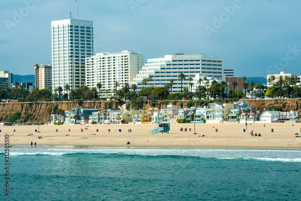 Fototapeta beach in los angeles with art deco buildings in background