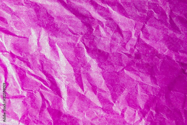 Fototapeta Bright pink crumpled paper texture background. The wrinkled crimson magenta design paper