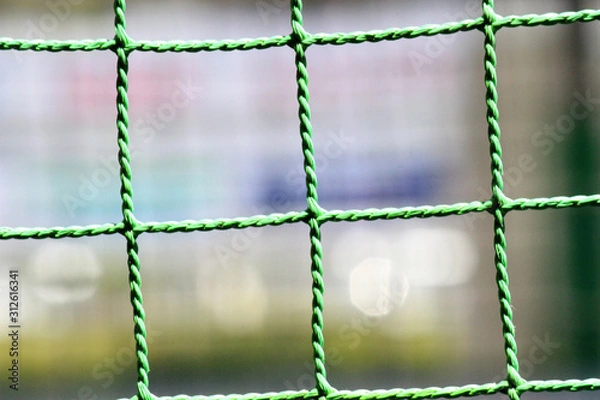 Obraz サッカーコート脇の緑色のネット