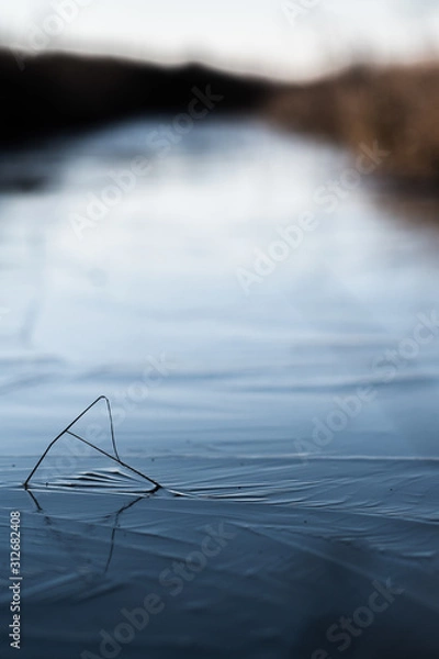 Obraz Frozen river, with banch