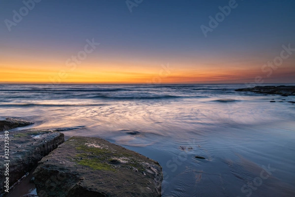 Fototapeta Sunrise Seascape with Soft Cloud on the Horizon