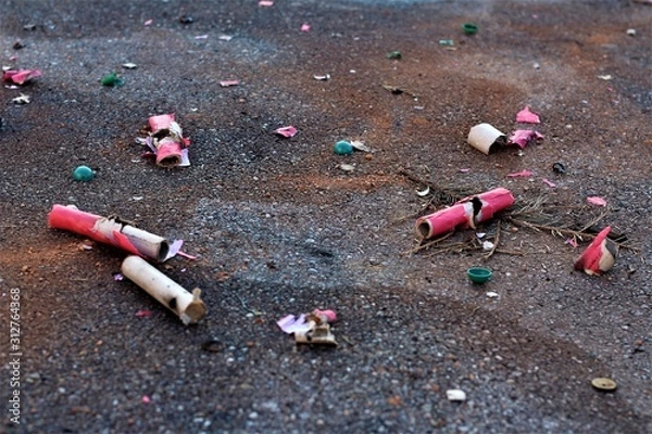 Obraz Firework and Celebrating Trash on the streets. Litter the Day after new years eve.