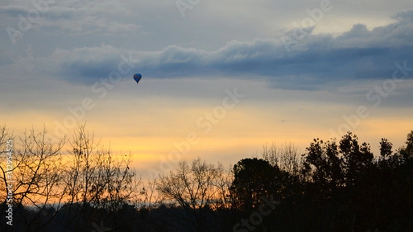 Obraz Hot Air Balloon at Dawn on Winter Day in the Blue Ridge Mountains with colorful sky & clouds.