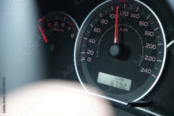 Obraz closeup side view of speedometer 120 kph speed