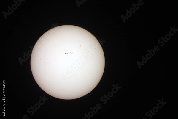 Fototapeta Solar activity and Sunspots, as viewed through a telescope