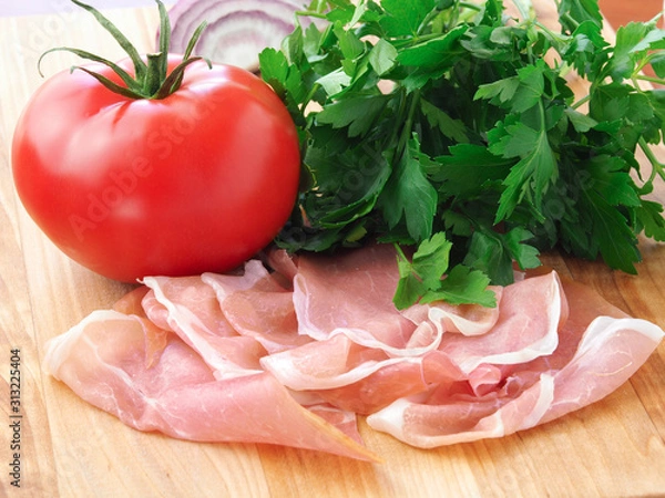 Fototapeta Tomato, parsley and thinly sliced ham