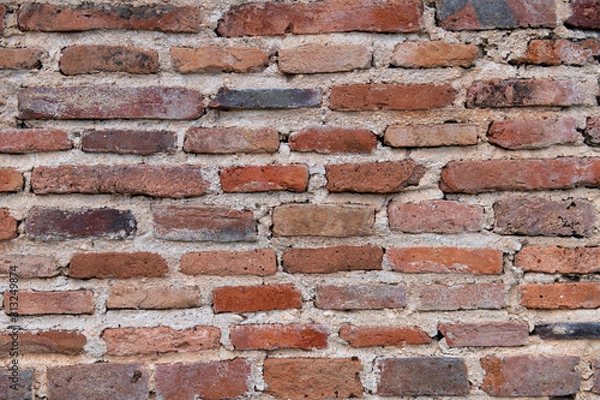 Obraz brick wall background. brick house. red wall.