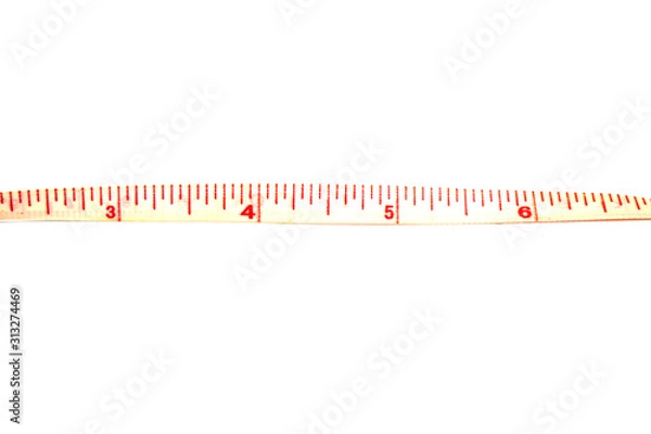 Fototapeta Measuring tape on white background with copy space - 3 4 5 6 inch .