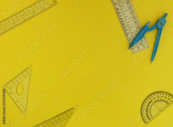 Obraz A school supplies on a yellow background