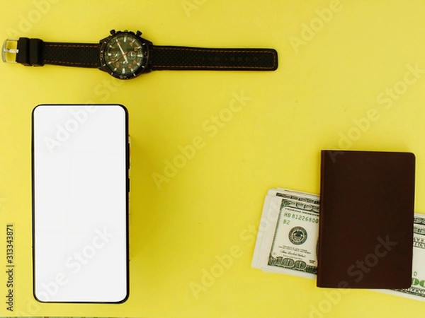 Obraz The white screen smartphone with a top $ 100 bank note and a yellow background calculator top view