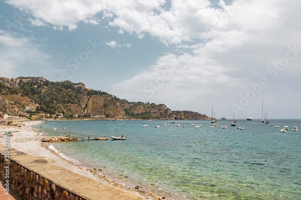 Fototapeta Tropical island and sea with luxury boats