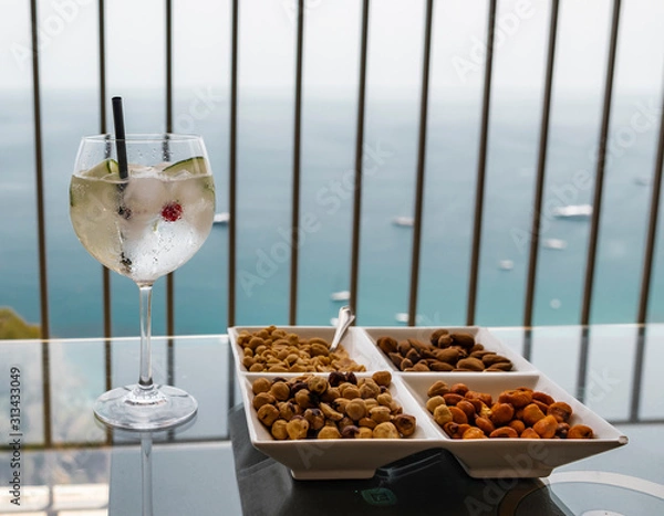Obraz Cocktail and snacks in front of tropical sea