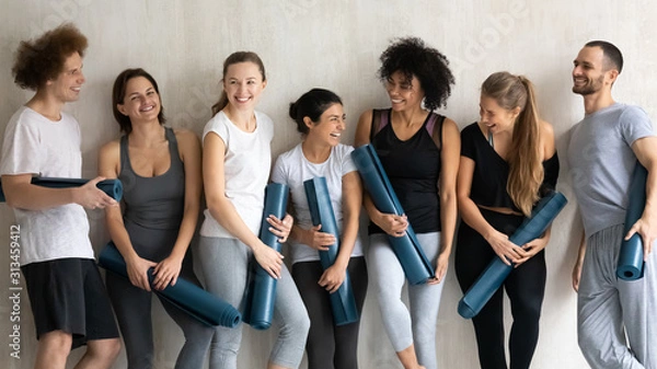 Fototapeta Happy diverse people having fun in studio after yoga training