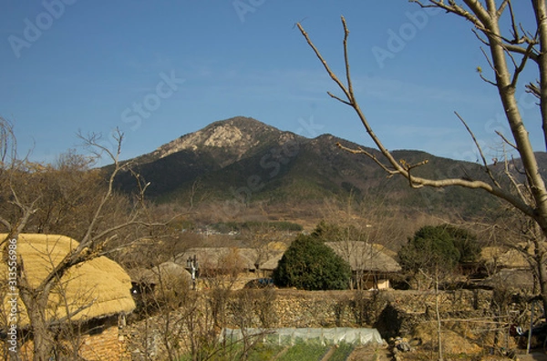 Fototapeta Old korean castle town in Suncheon, South Korea. The town have many  grass-roofed house of  the age of Joseon Dynasty. 